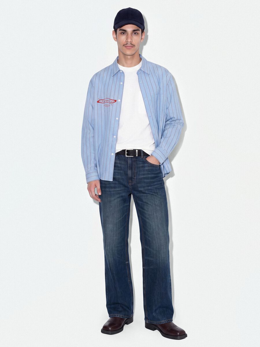 Jeans de ganga azul em algod&atilde;o puro com corte flare_0
