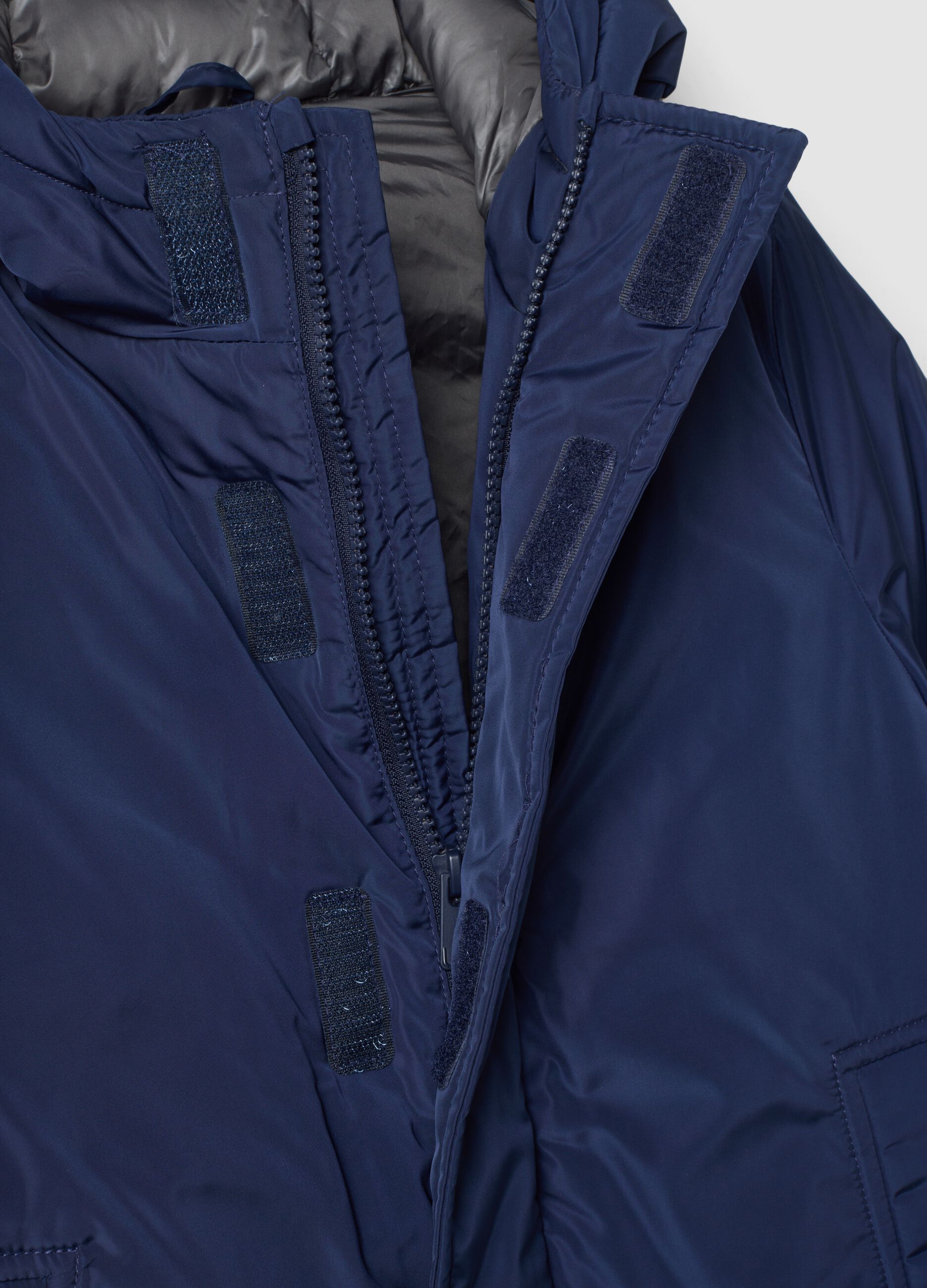 Navyblaue wattierte Jacke mit Kapuze