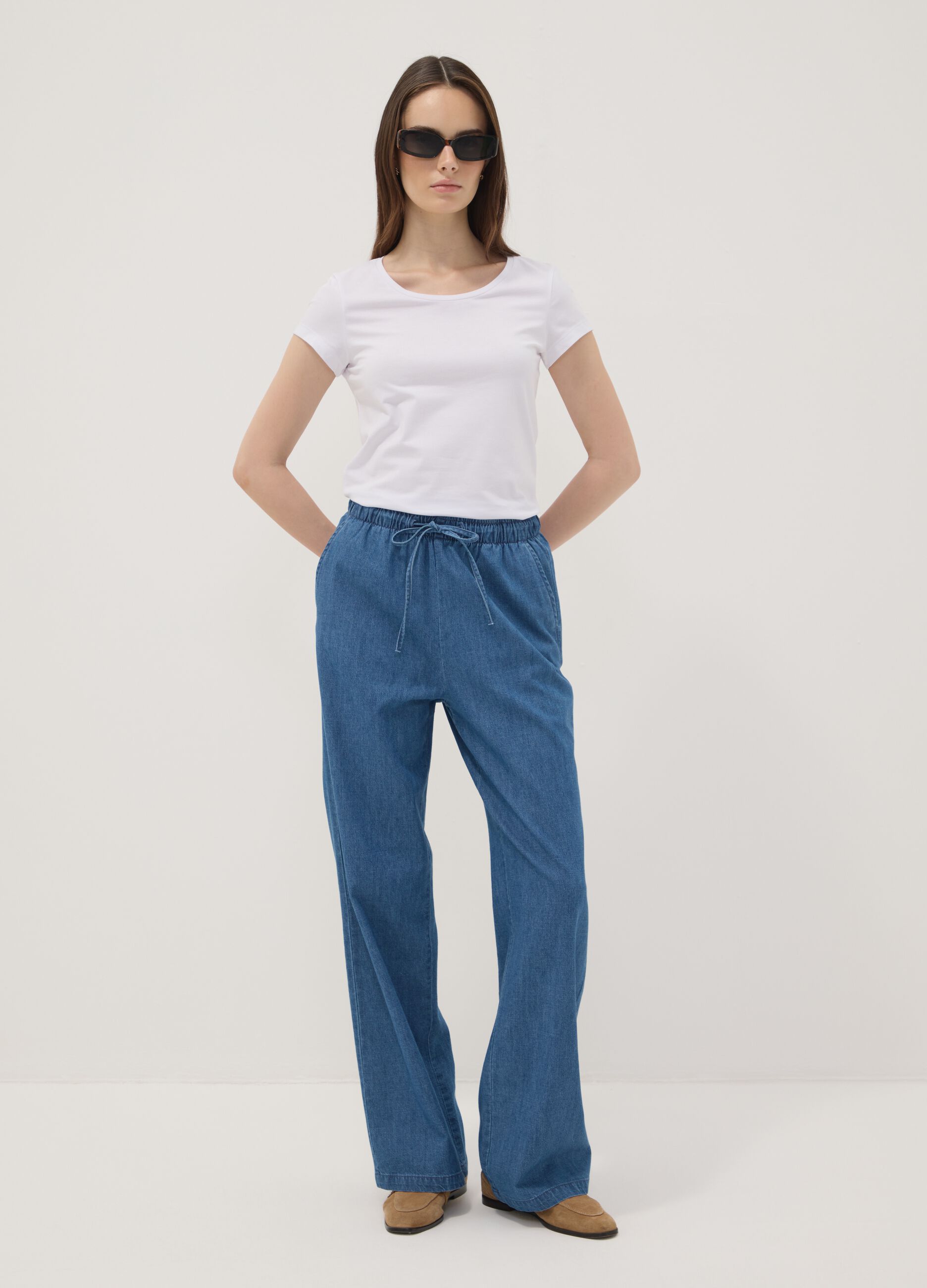 Pantaloni denim blu in puro cotone wide leg con coulisse