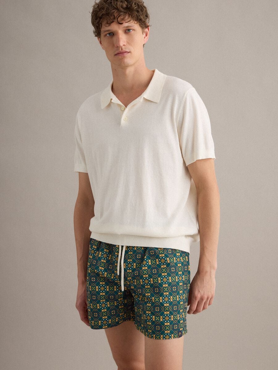 Green patterned swim shorts with elasticated waist_0
