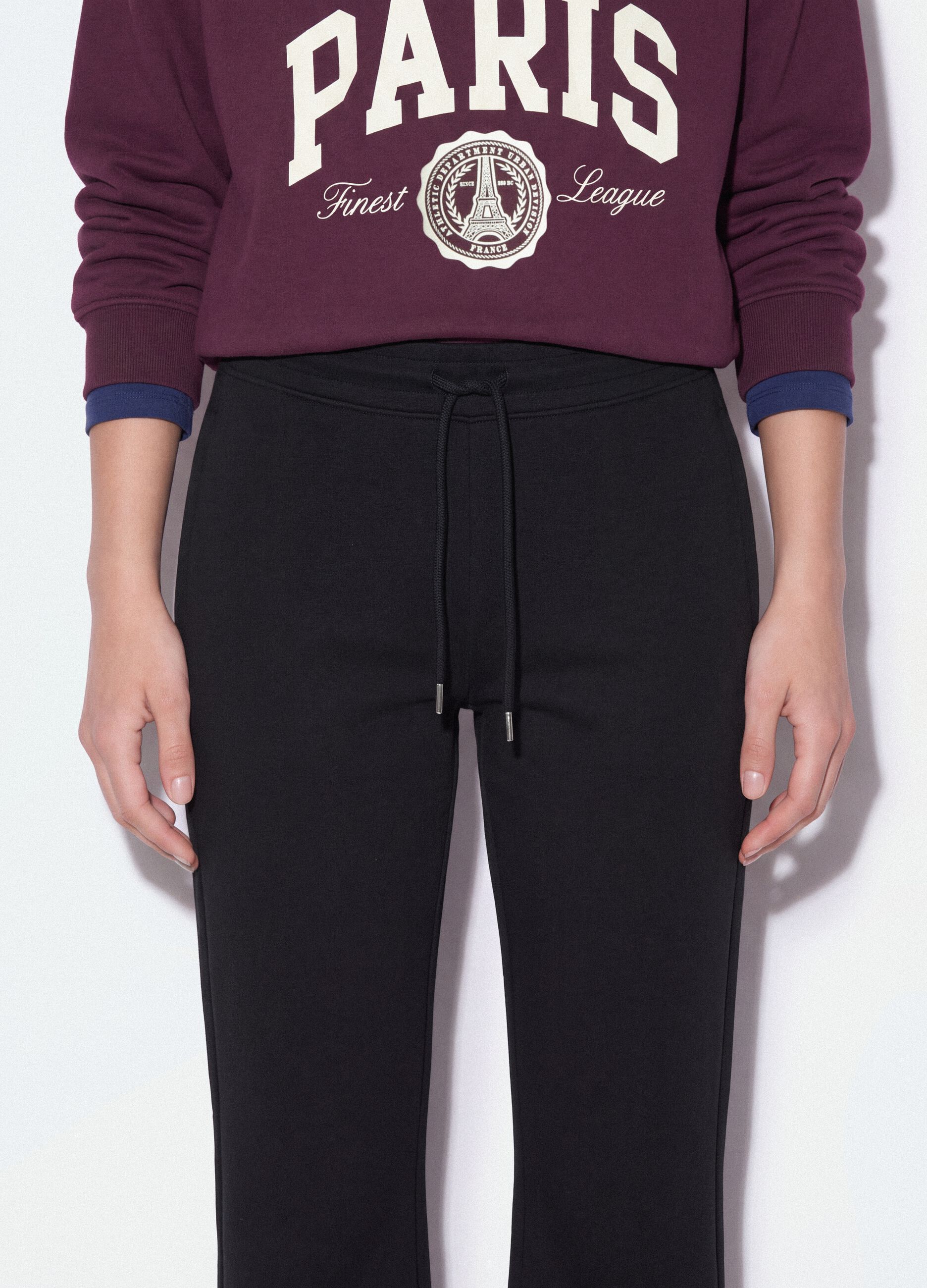 Blaue Flare-Jogger aus elastischer Bio-Baumwolle