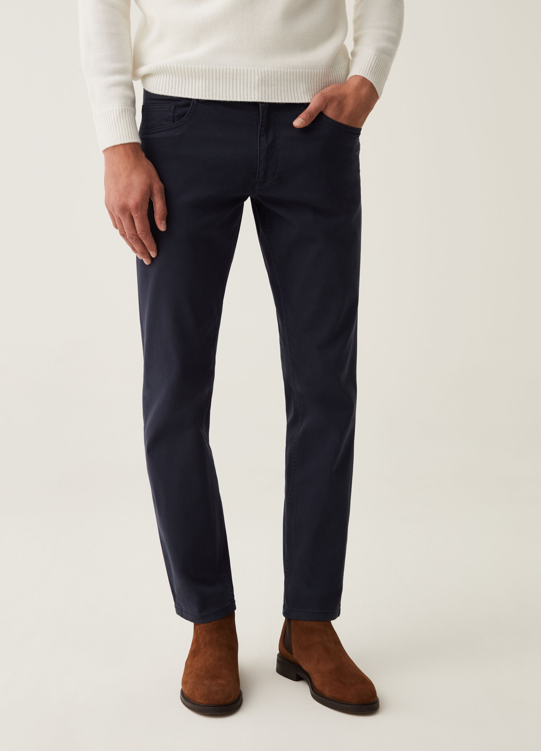 Solid colour trousers with five pockets_1