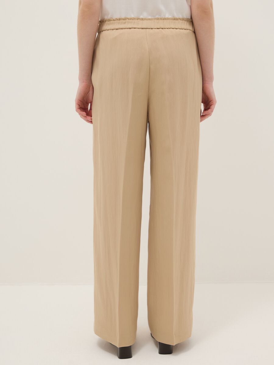 Beige wide leg jogger trousers in Lyocell and viscose blend_2