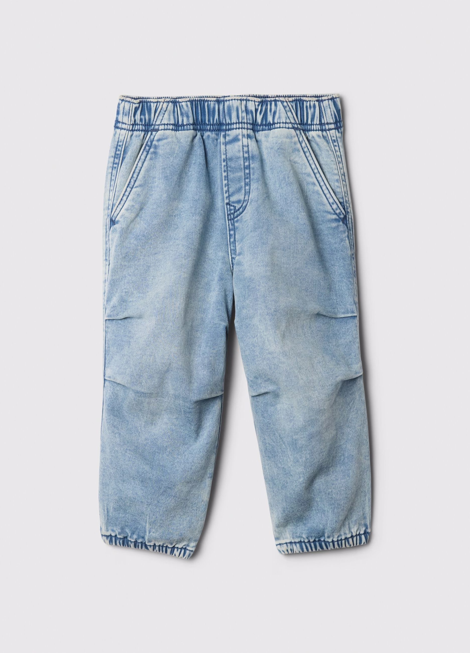 Pull-on denim jeans with acid wash effect
