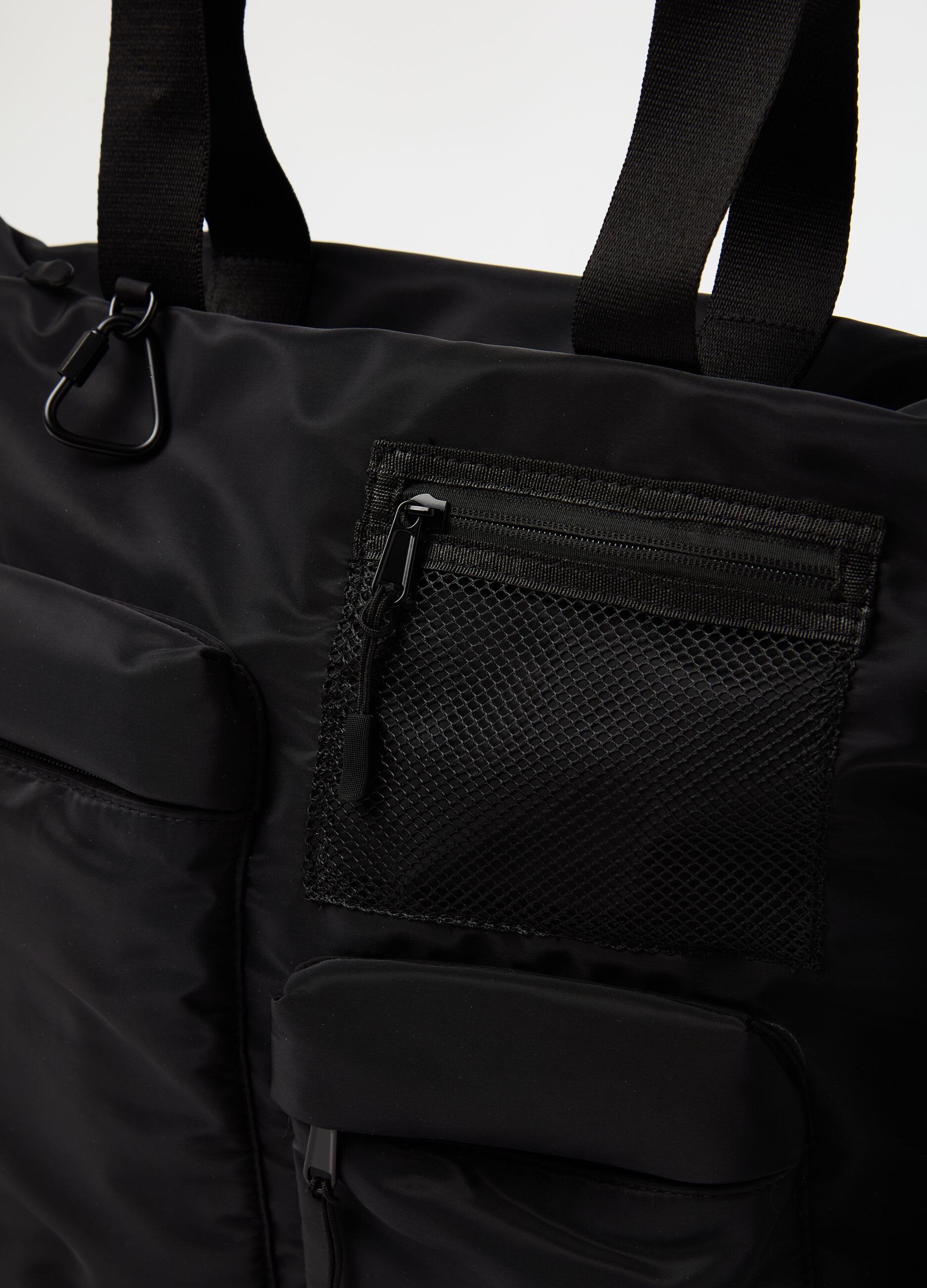 Shopping bag with external pockets