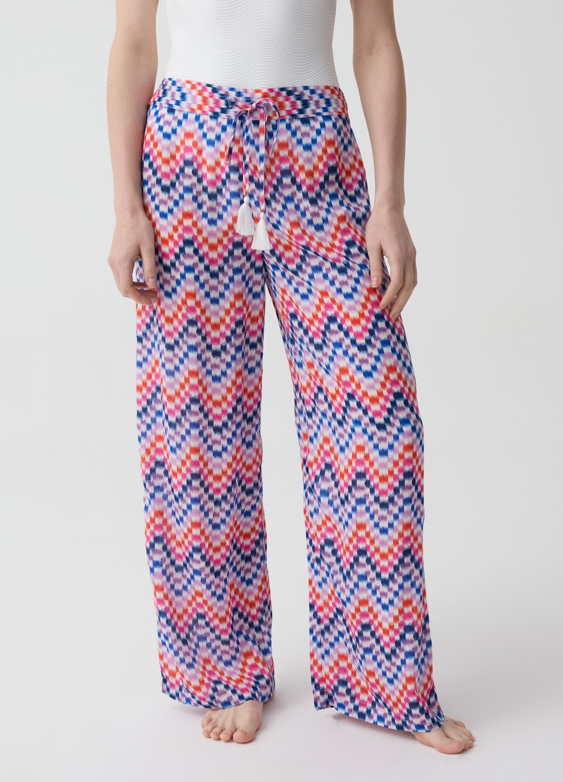 Beach cover-up trousers with pixel print
