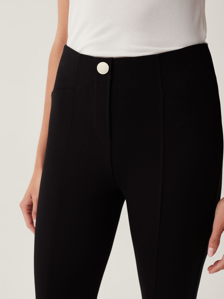 Stretch leggings with button_3