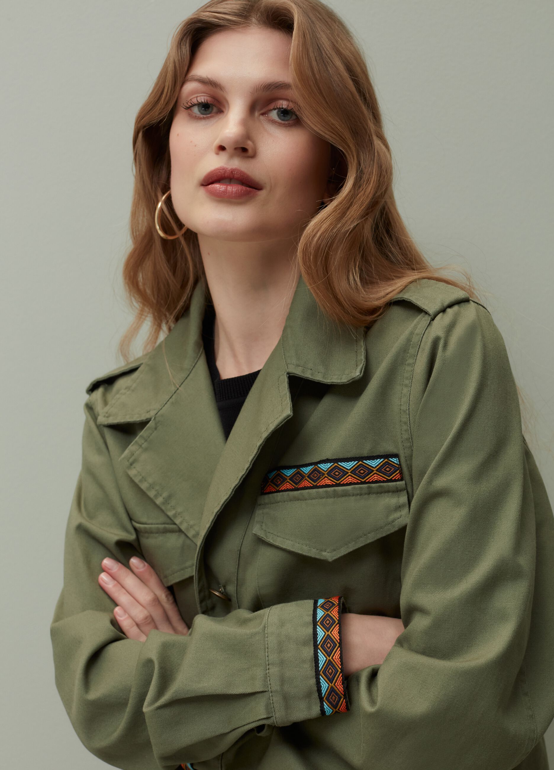 Short jacket with traditional detailing