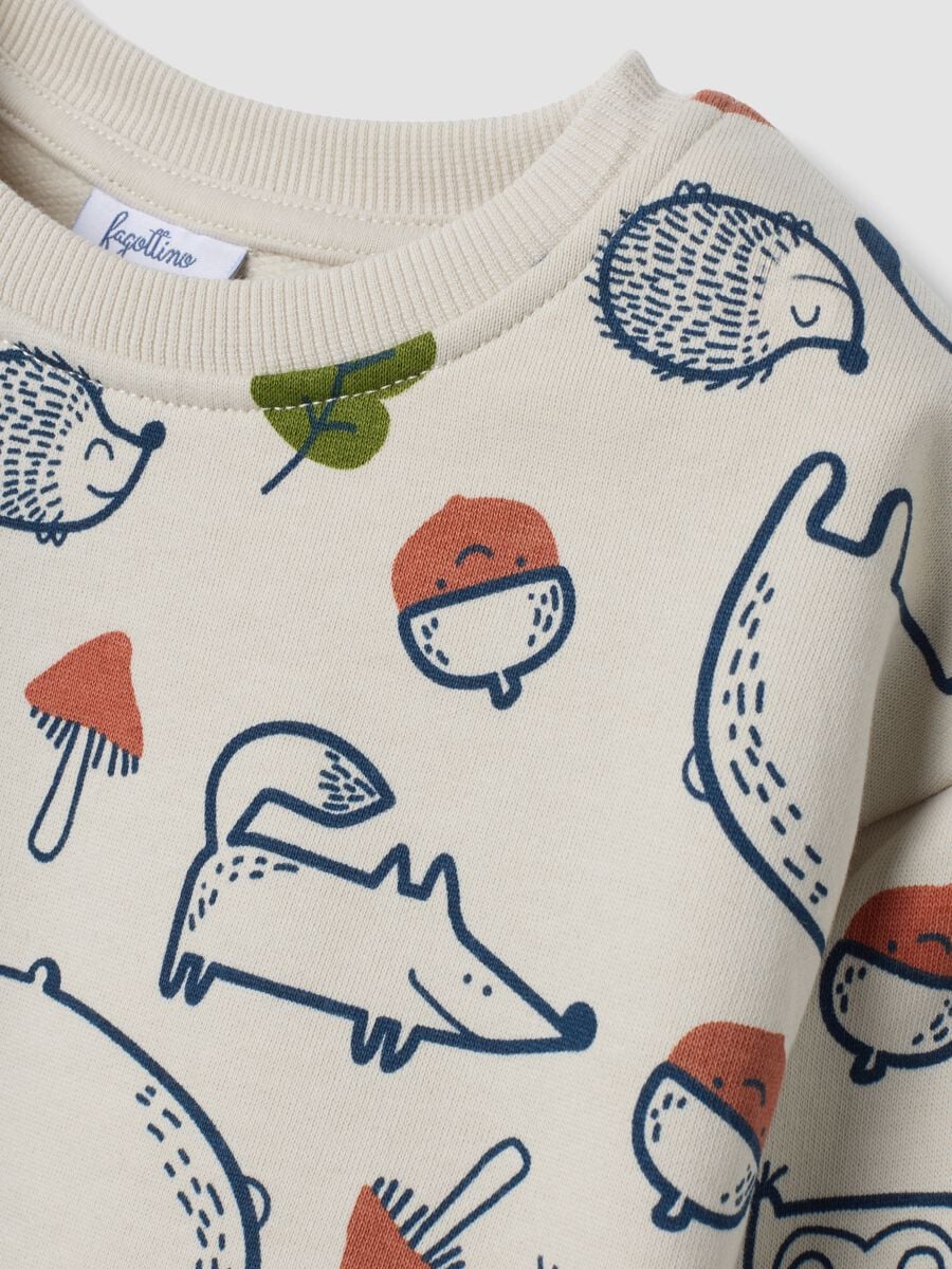 Felpa beige in puro cotone con girocollo e stampa animali over fit_2