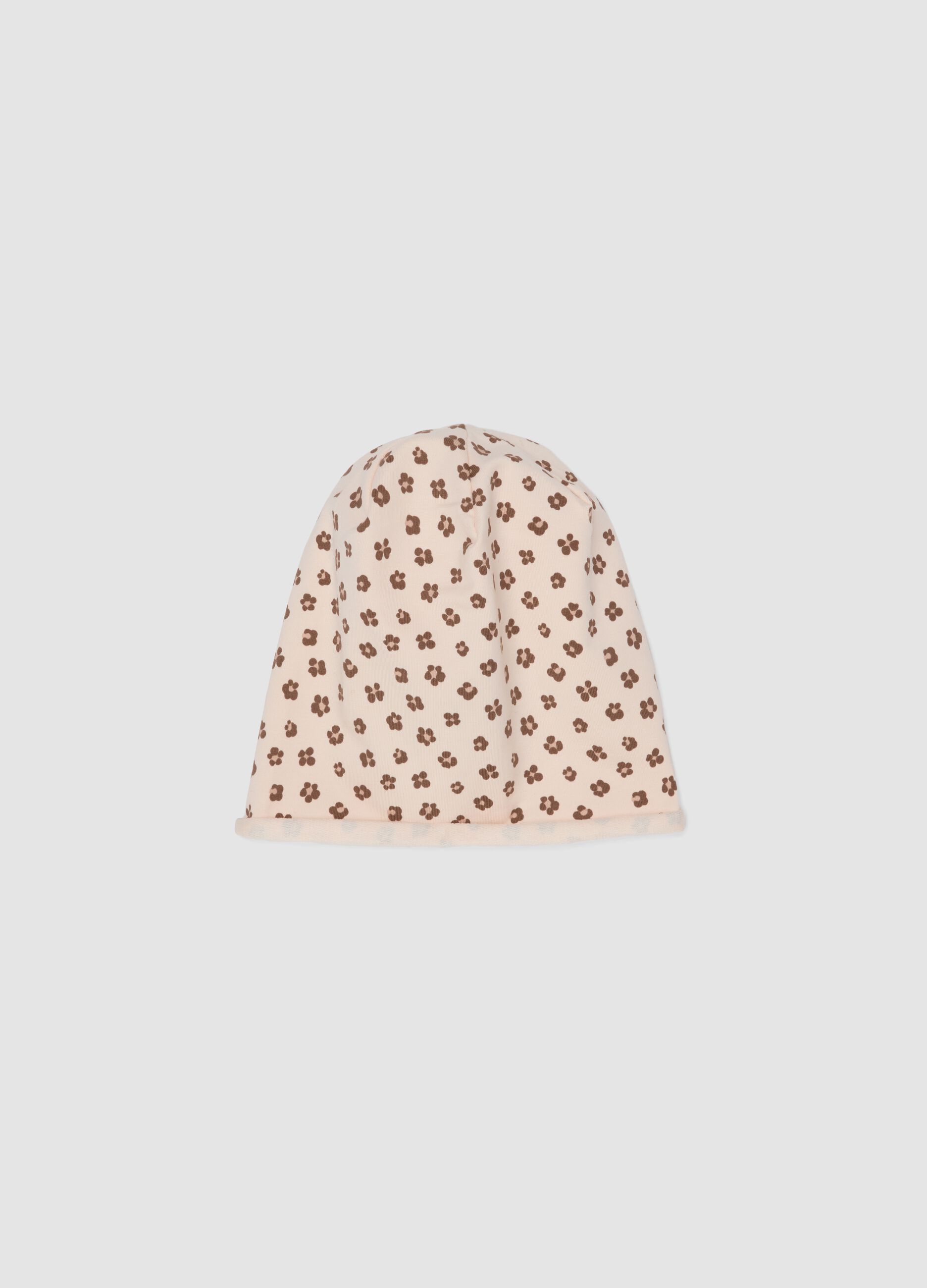 Cappello rosa in cotone organico elasticizzato a fiori per bimba