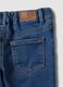 Blue stretch cotton jeans with varsity-style appliqu&eacute;s for baby boy_3
