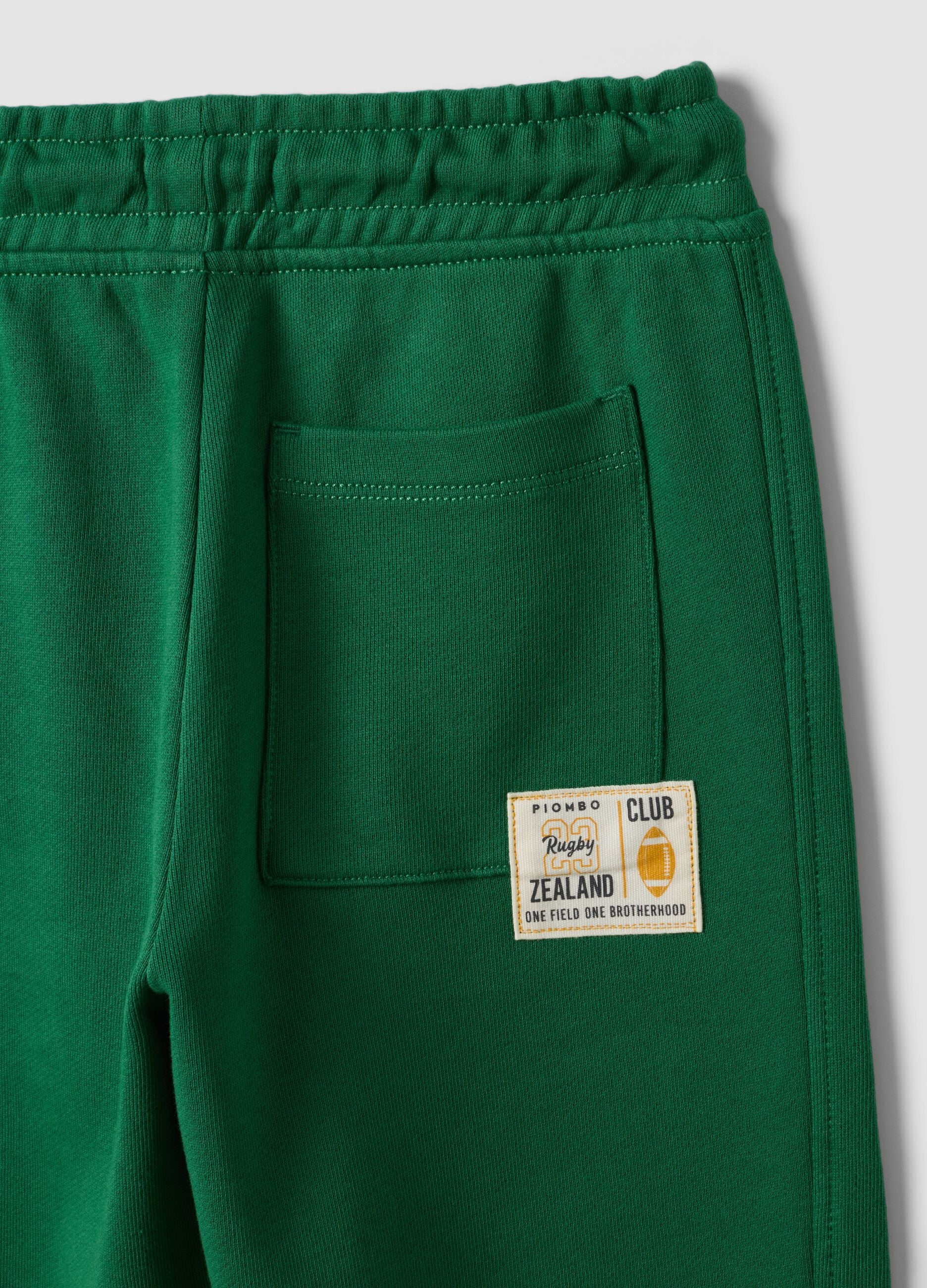 Pantaloni jogger verdi in puro cotone con vita elasticizzata per bambino