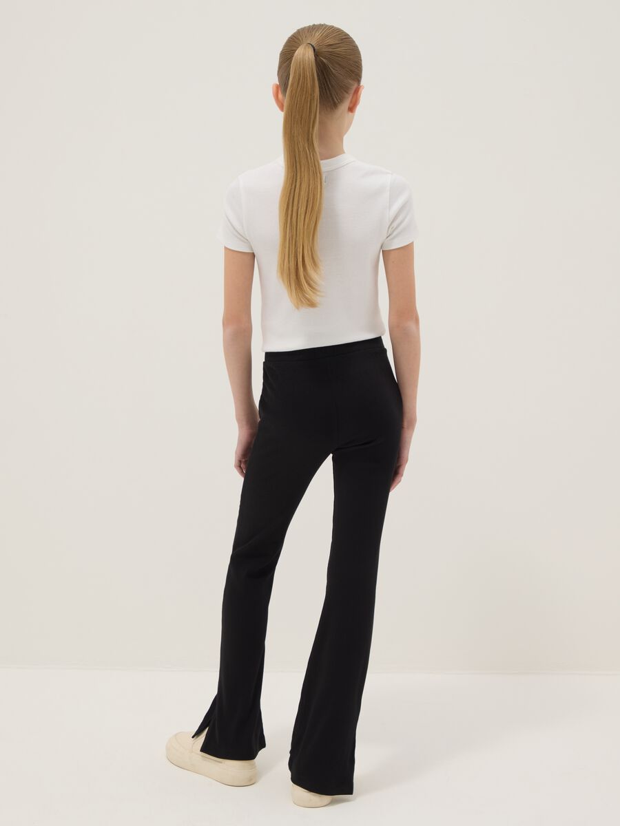 Schwarze M&auml;dchen-Leggings aus Stretch-Baumwolle im Flare-Fit_1