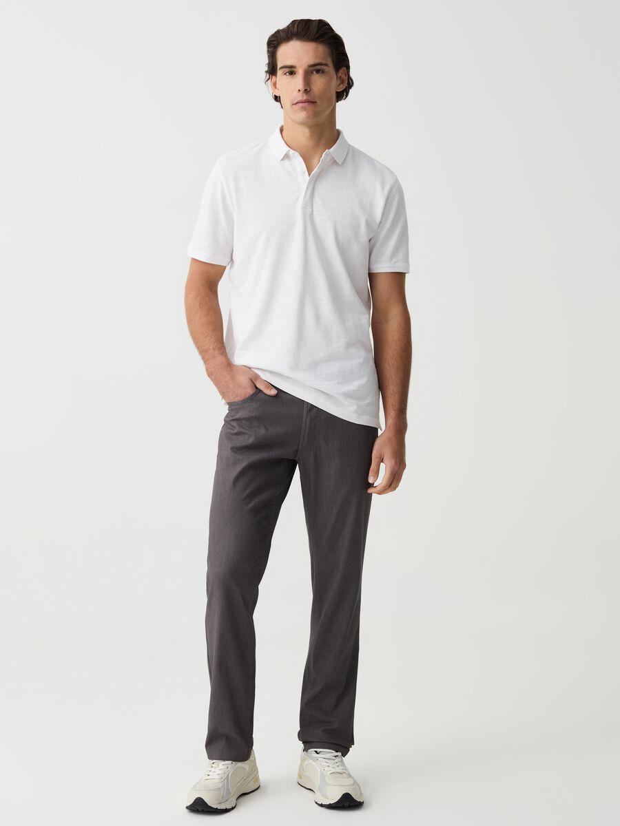 Slim-fit trousers with thin stripes_0