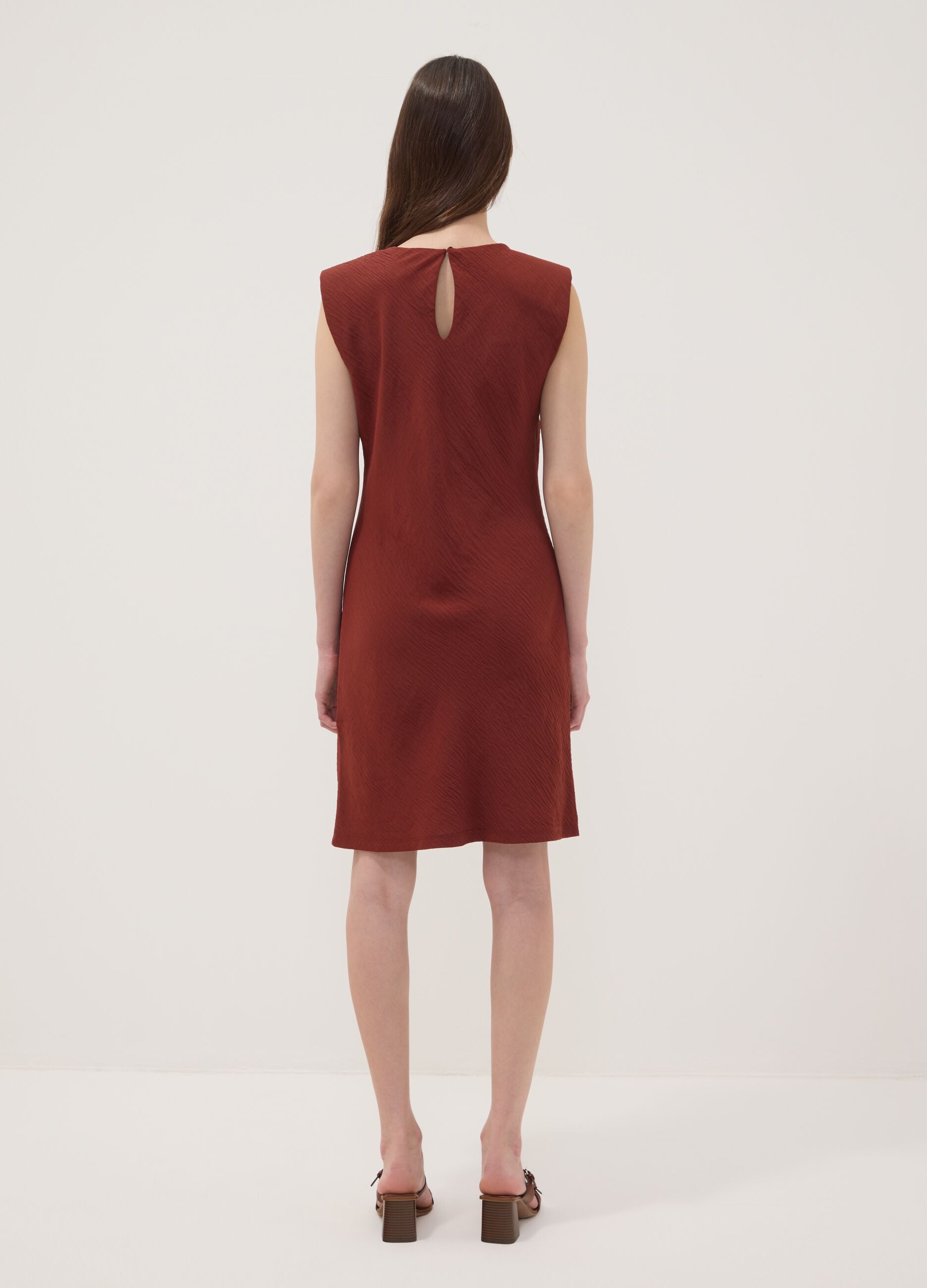 Red fitted dress with ruched detailing