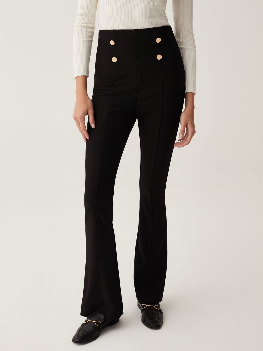 Flare-fit trousers with golden buttons_1