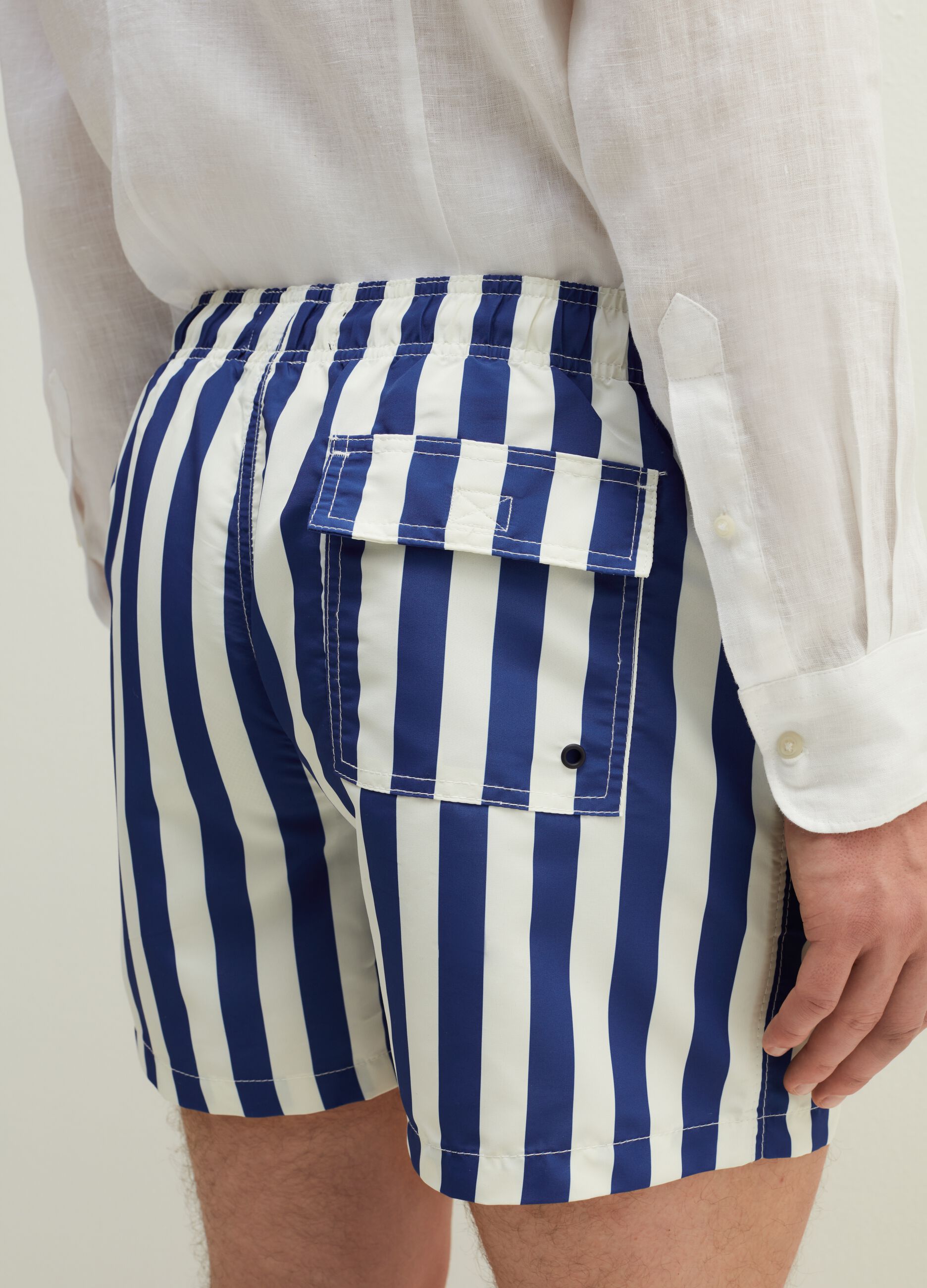 Swimming trunks with striped pattern