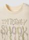 T-shirt beige in puro cotone con collo a costine e scritta frontale_1