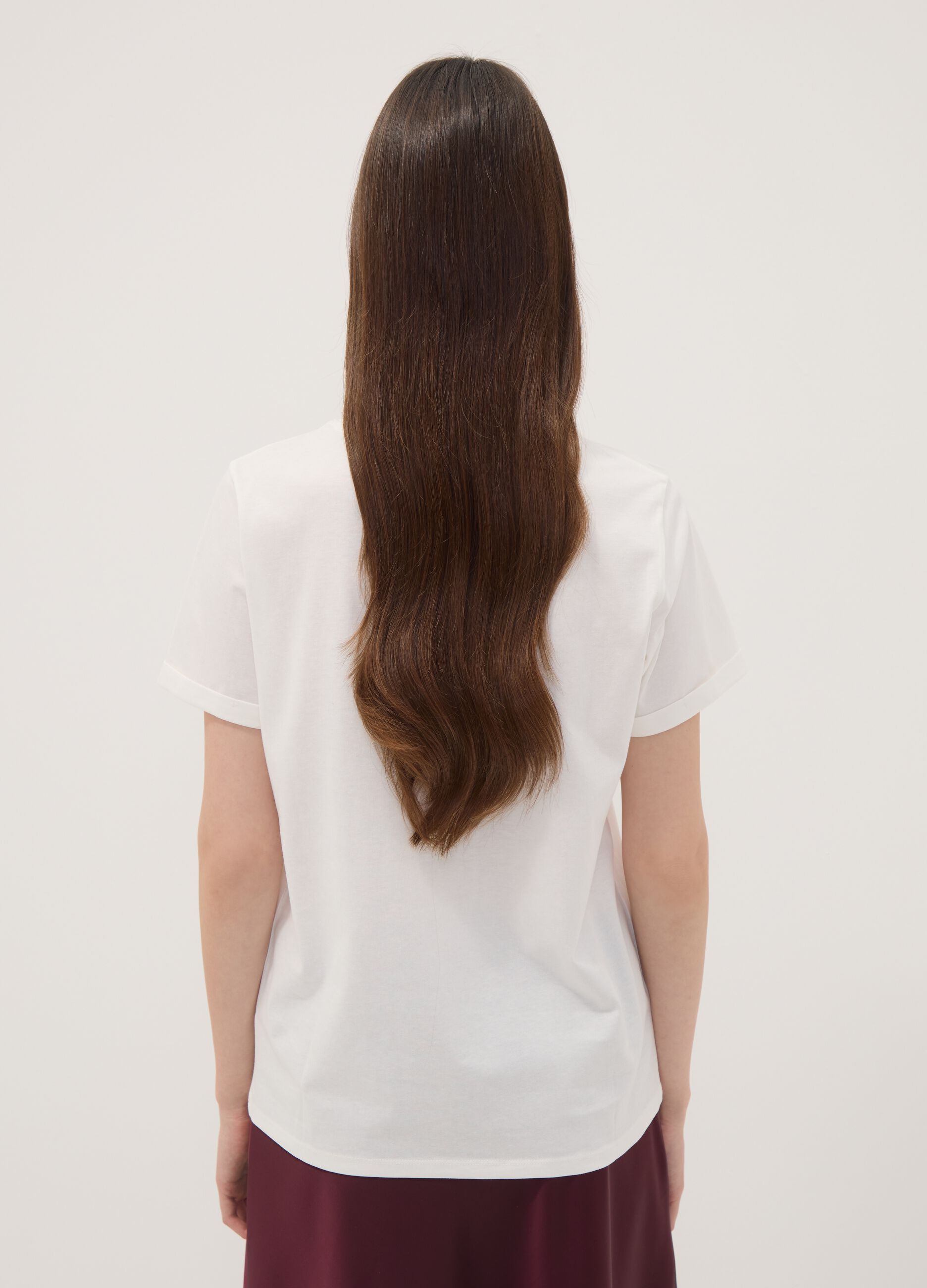 T-shirt bianca in puro cotone con girocollo e stampa floreale regular fit