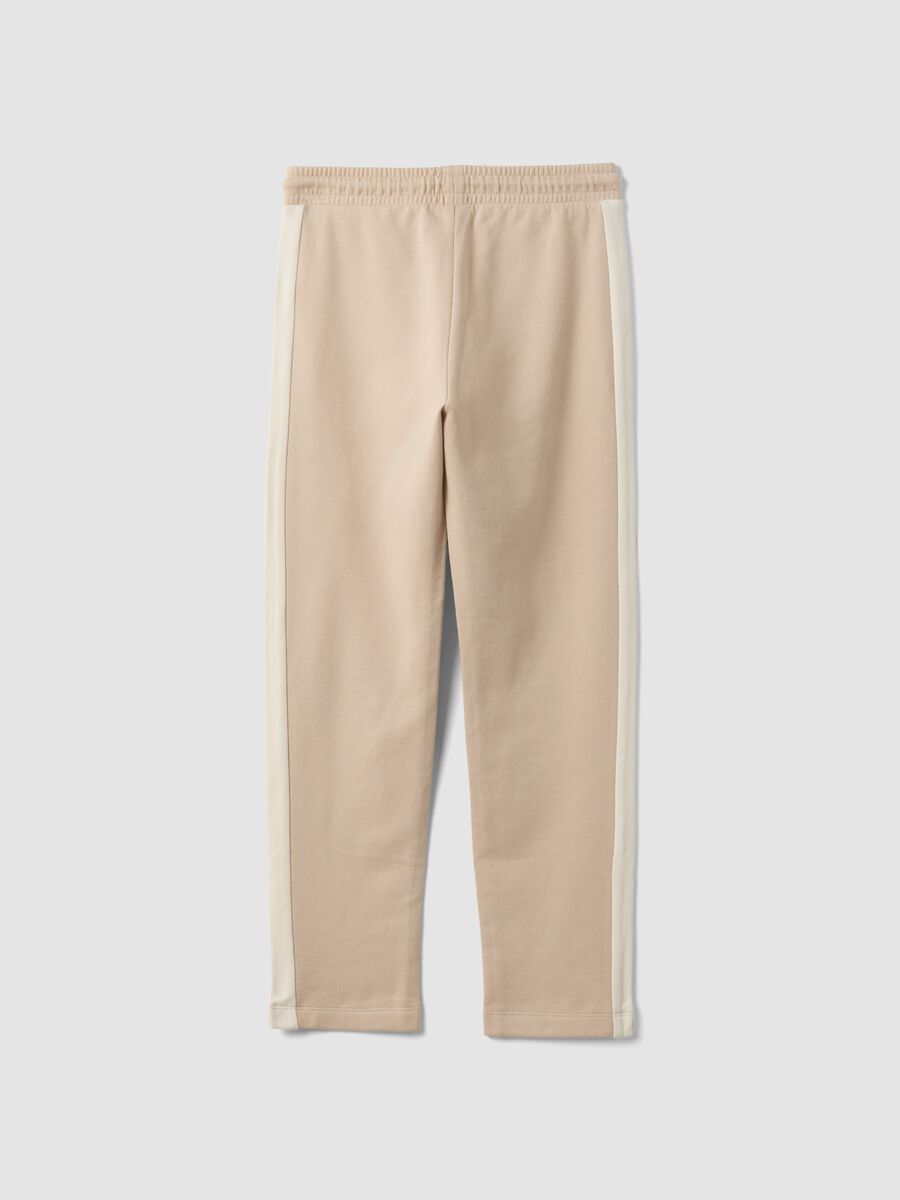 Beige pure cotton jogger trousers with side stripes for boys_4