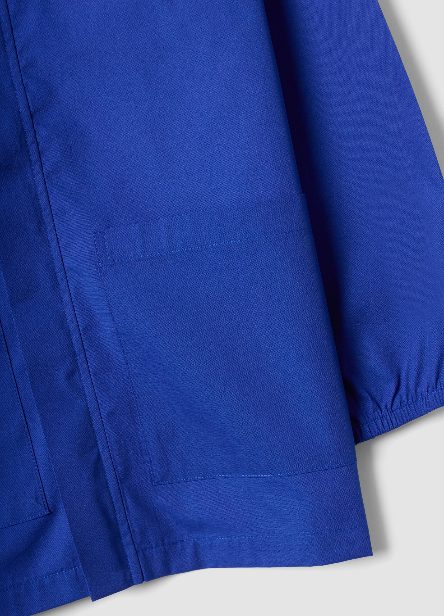 Blue boys&rsquo; school apron with zip and Mario Kart embroidery