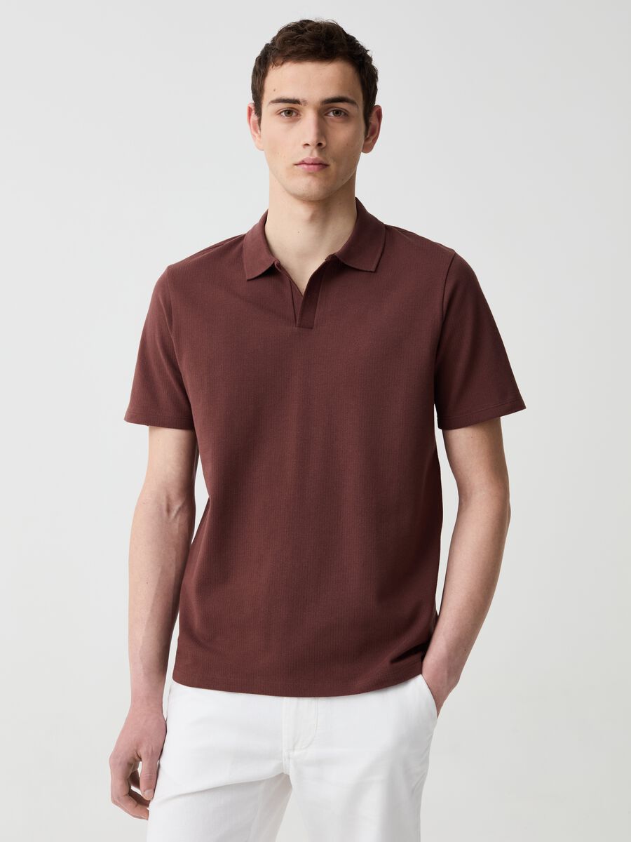 Organic cotton polo shirt with textured weave_0