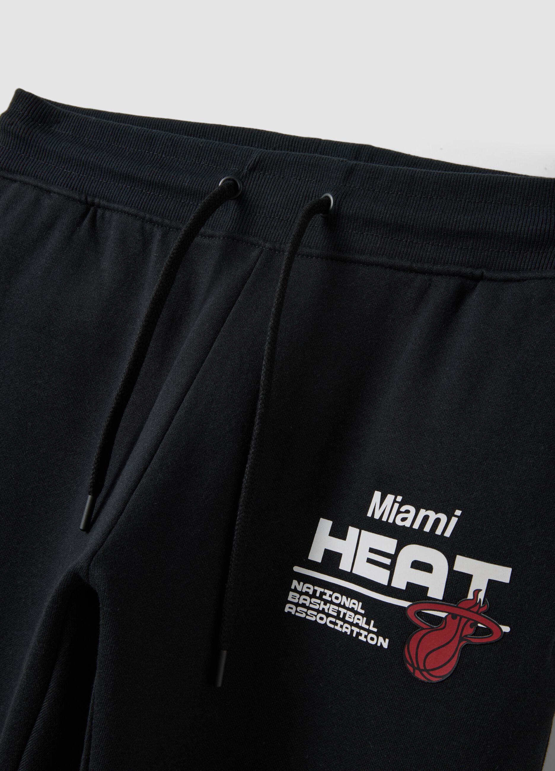 Black cotton-blend joggers with Miami Heat print