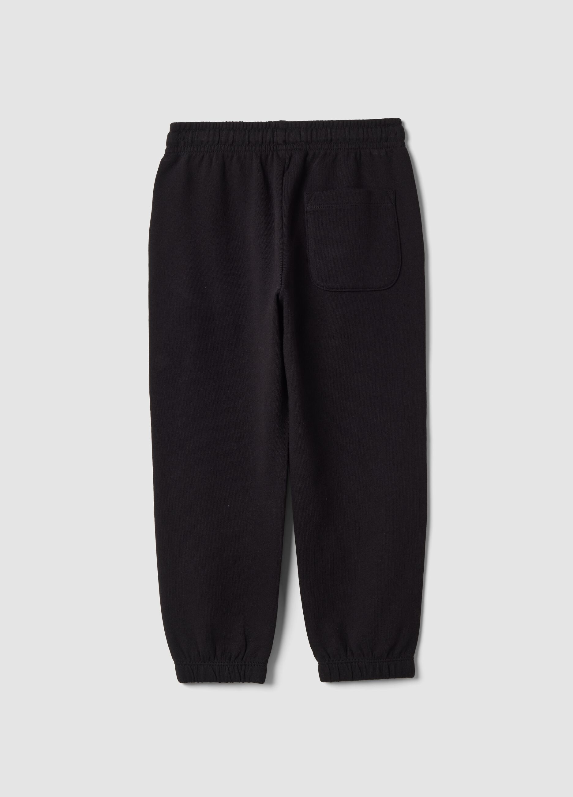 Pantaloni jogger neri in puro cotone con stampa a scacchi