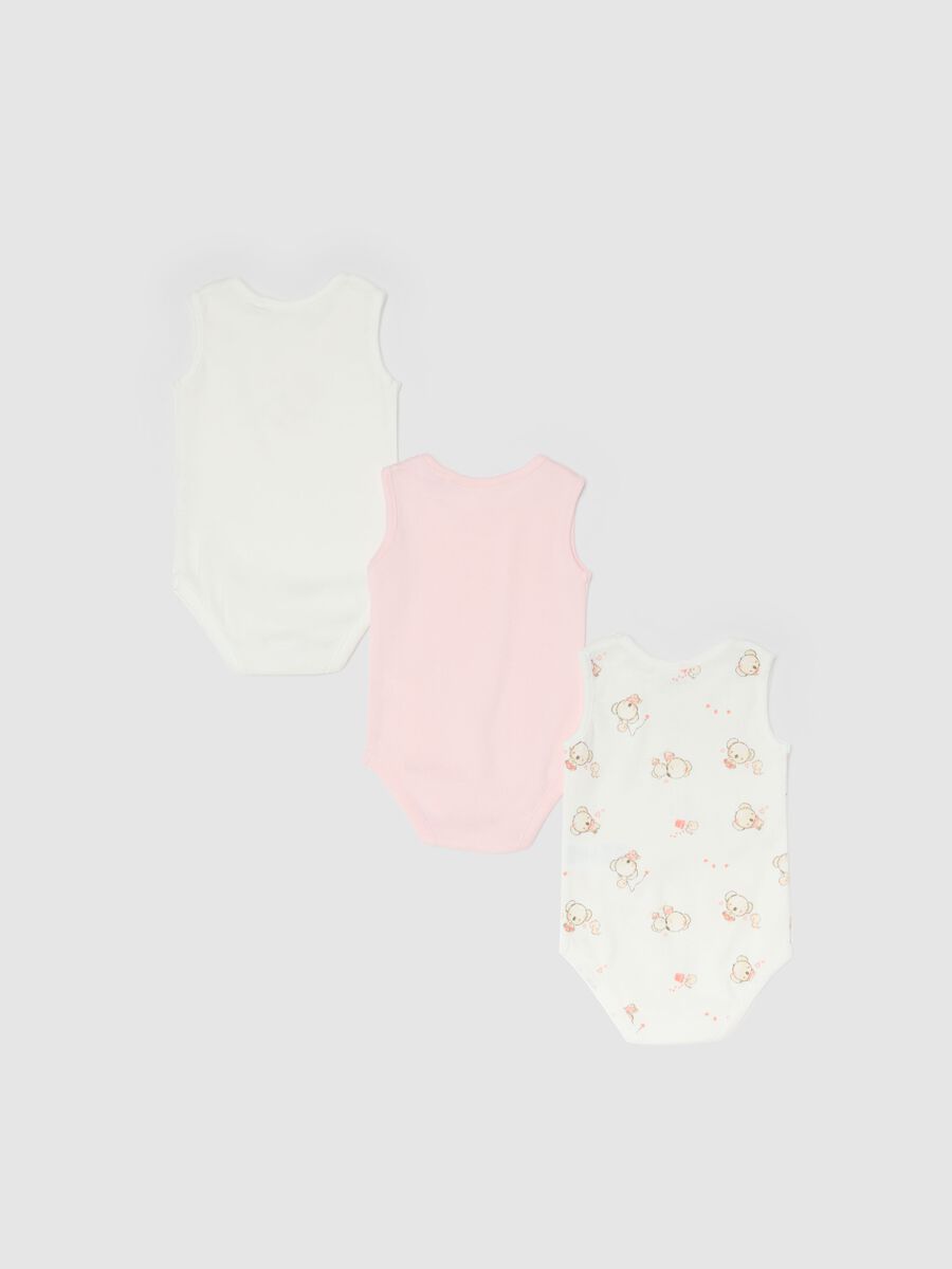 Pack of three sleeveless multicolour bodysuits in pure cotton for baby girls_1