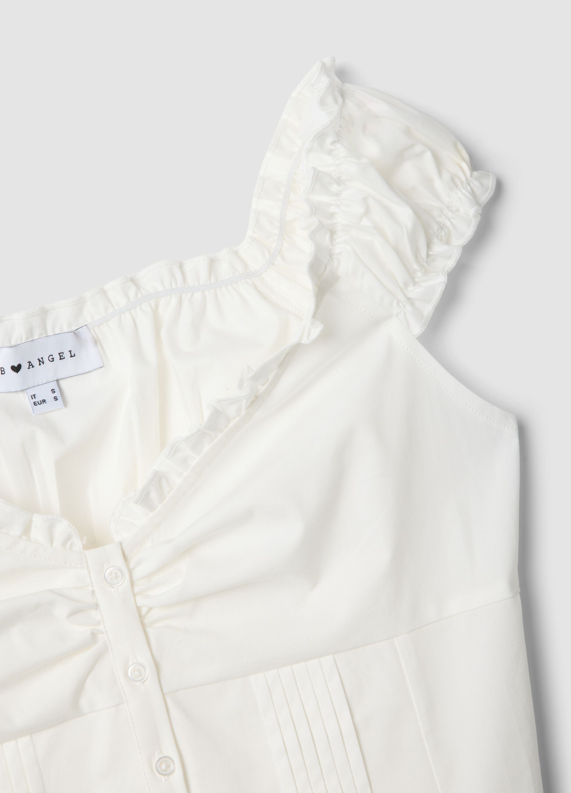 White organic cotton blouse with short sleeves