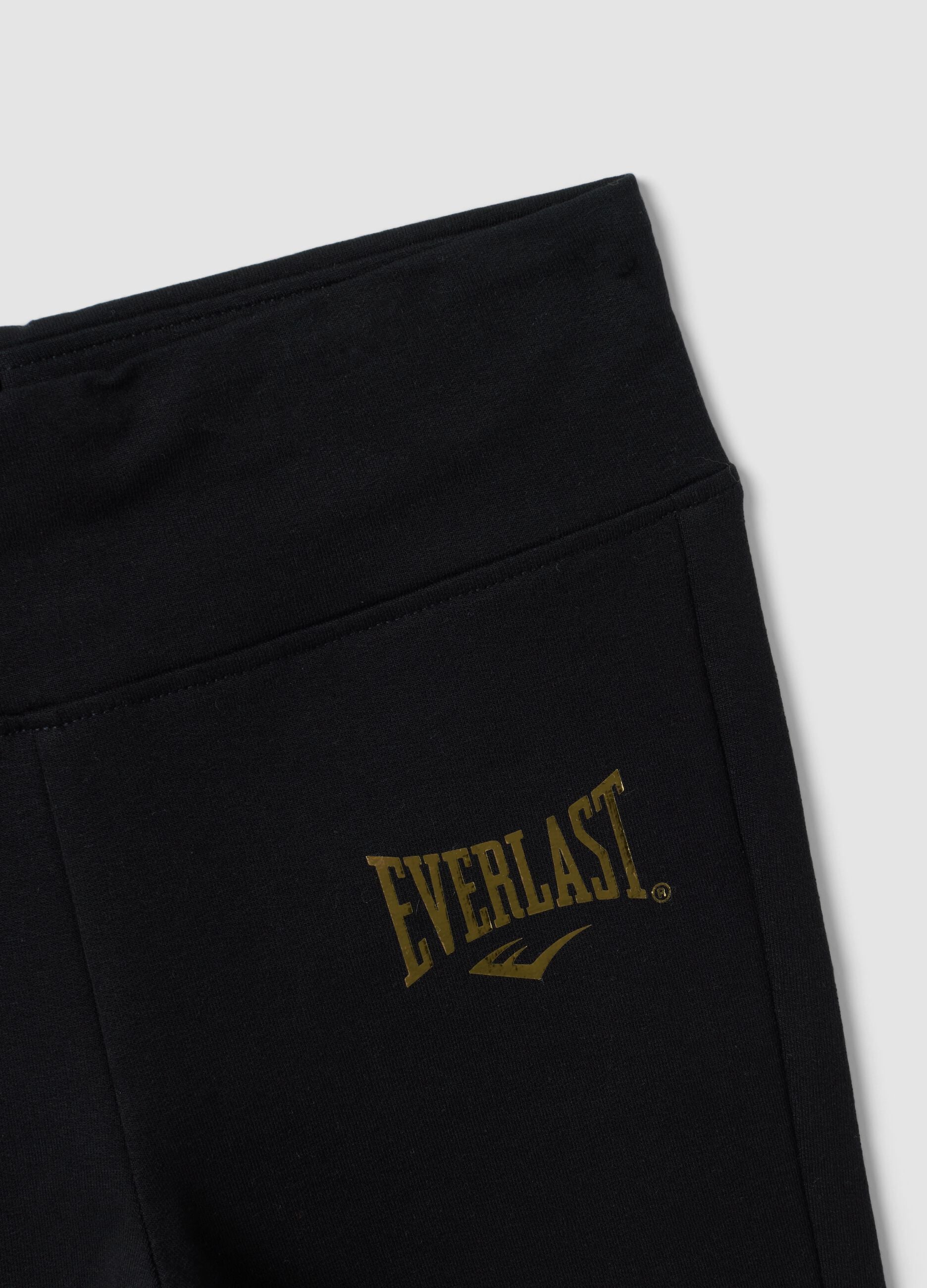 Leggings pretas em algod&atilde;o el&aacute;stico de corte regular para menina
