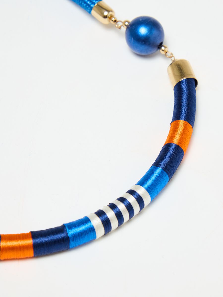 Half-moon necklace in cord with spheres_1