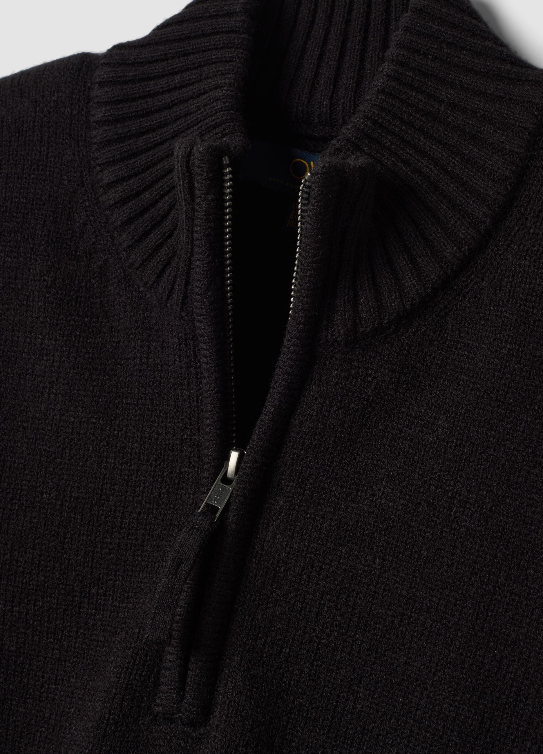 Black half-zip jumper