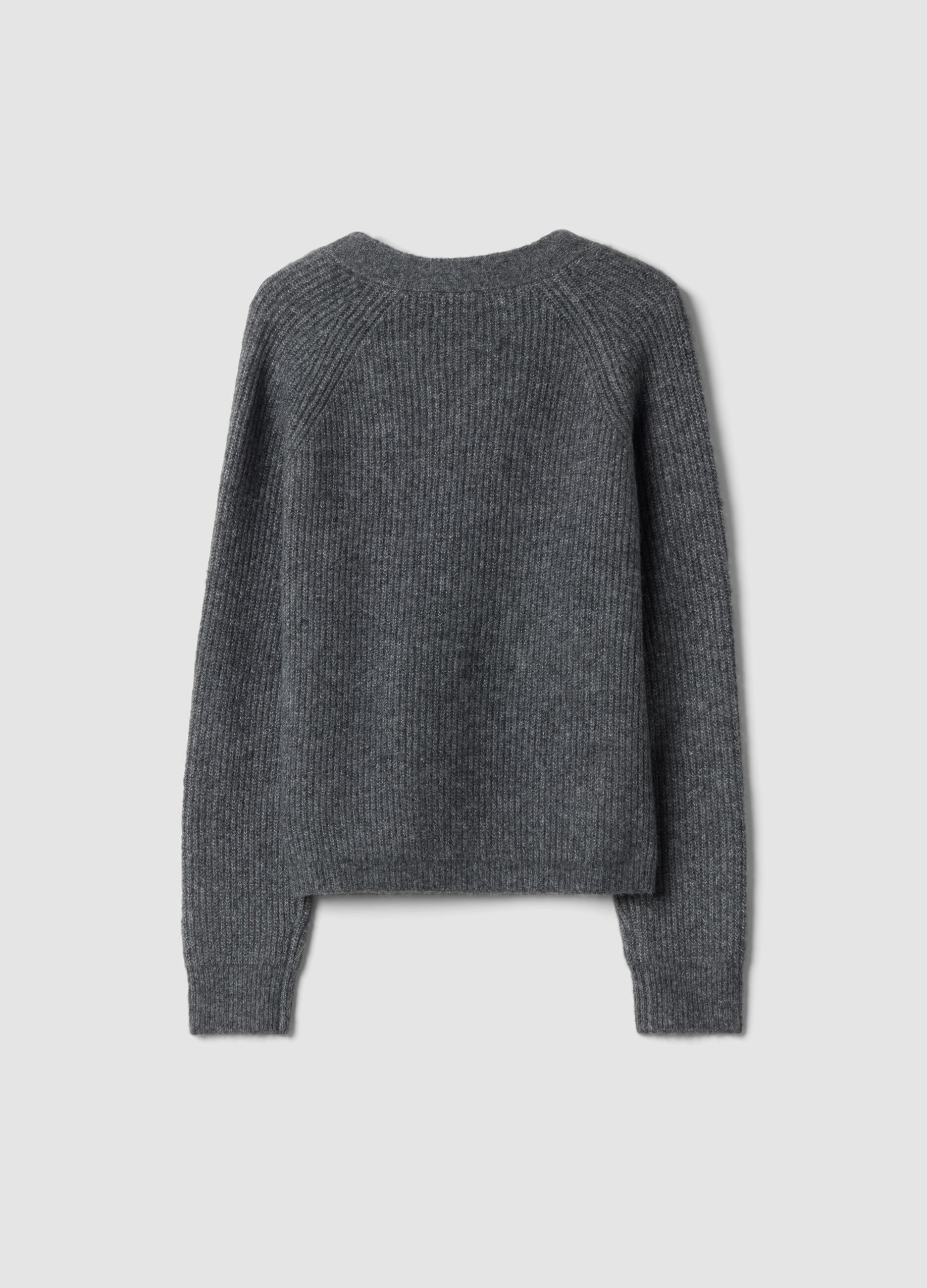 Graue Strickjacke aus elastischer Wolle mit tiefem V-Ausschnitt, Oversize-Fit