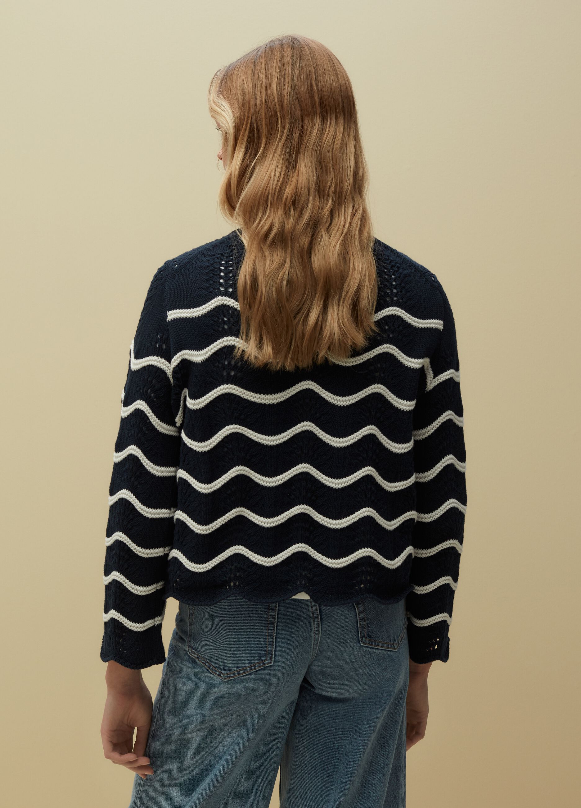 Crochet sweater with waved stripes