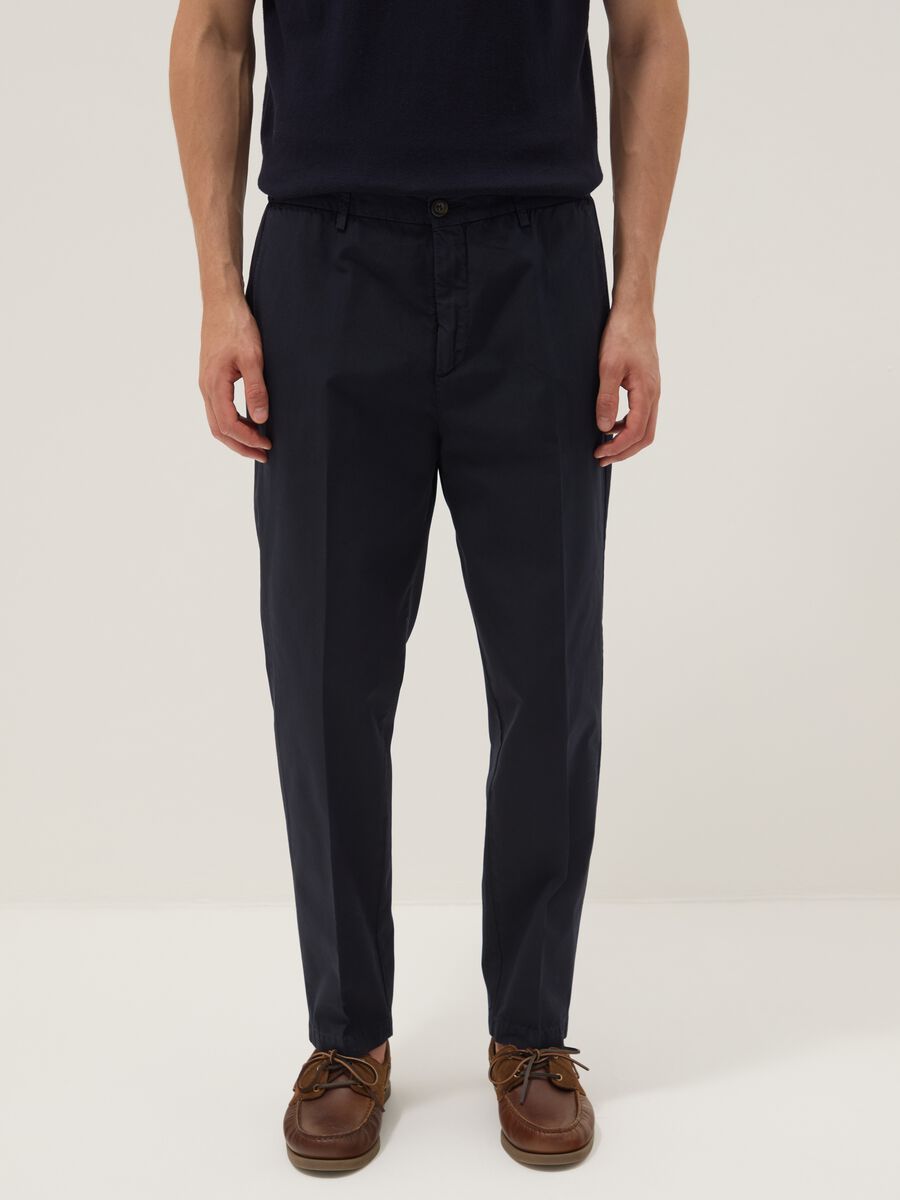 Blue cotton chino trousers with carrot fit_1