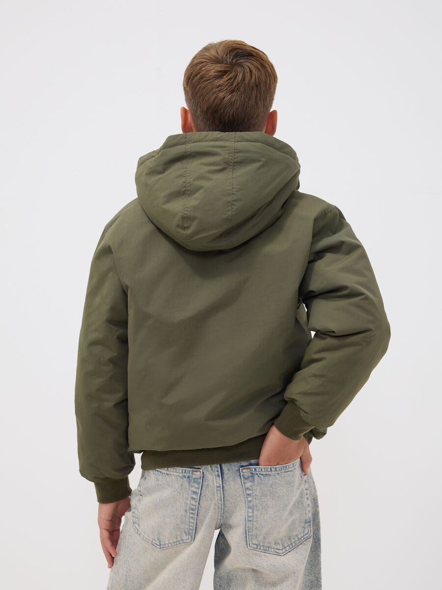Green waterproof hooded bomber jacket with zip for boys_1