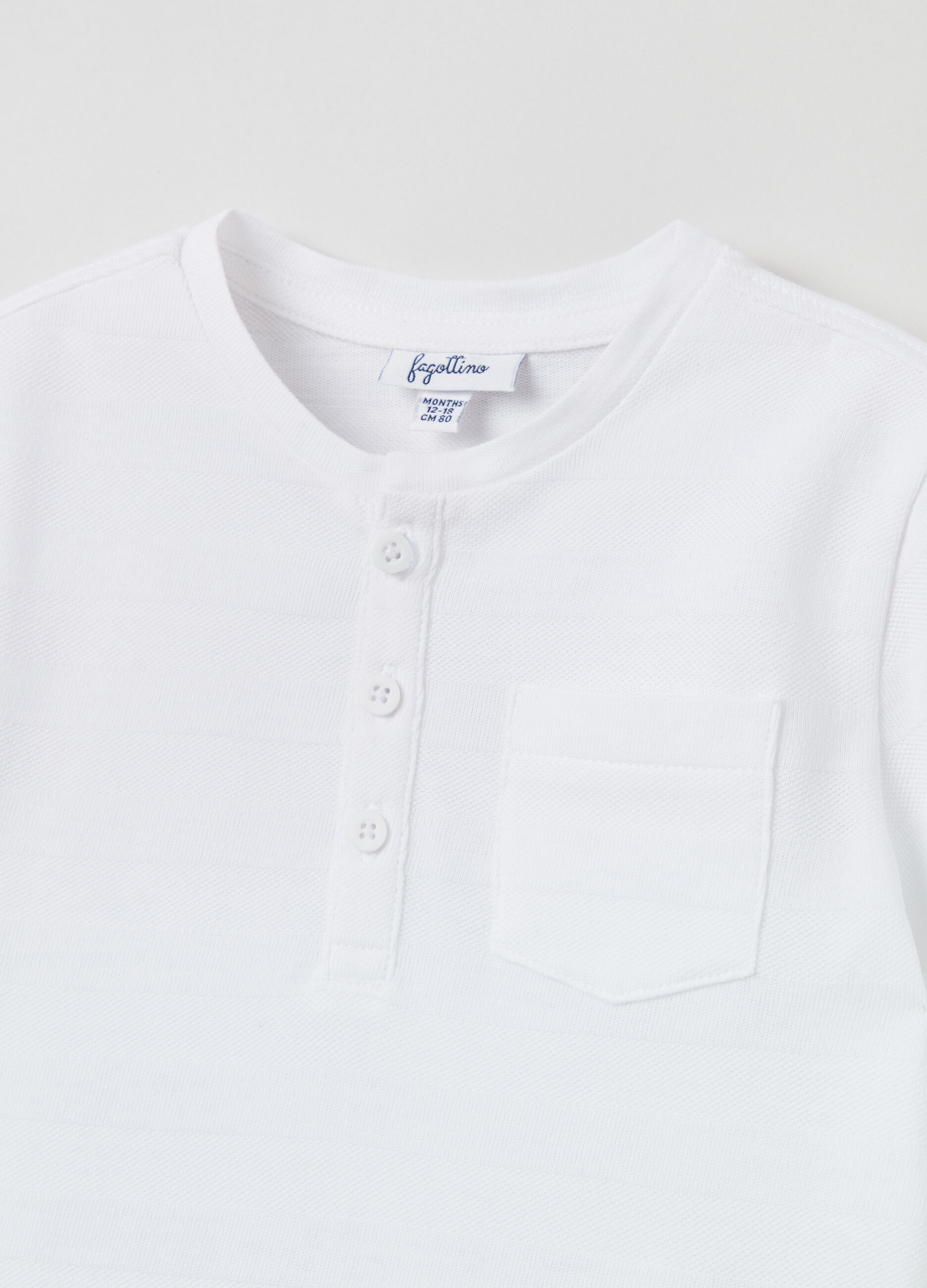 Camiseta de algodón texturizado con bolsillo