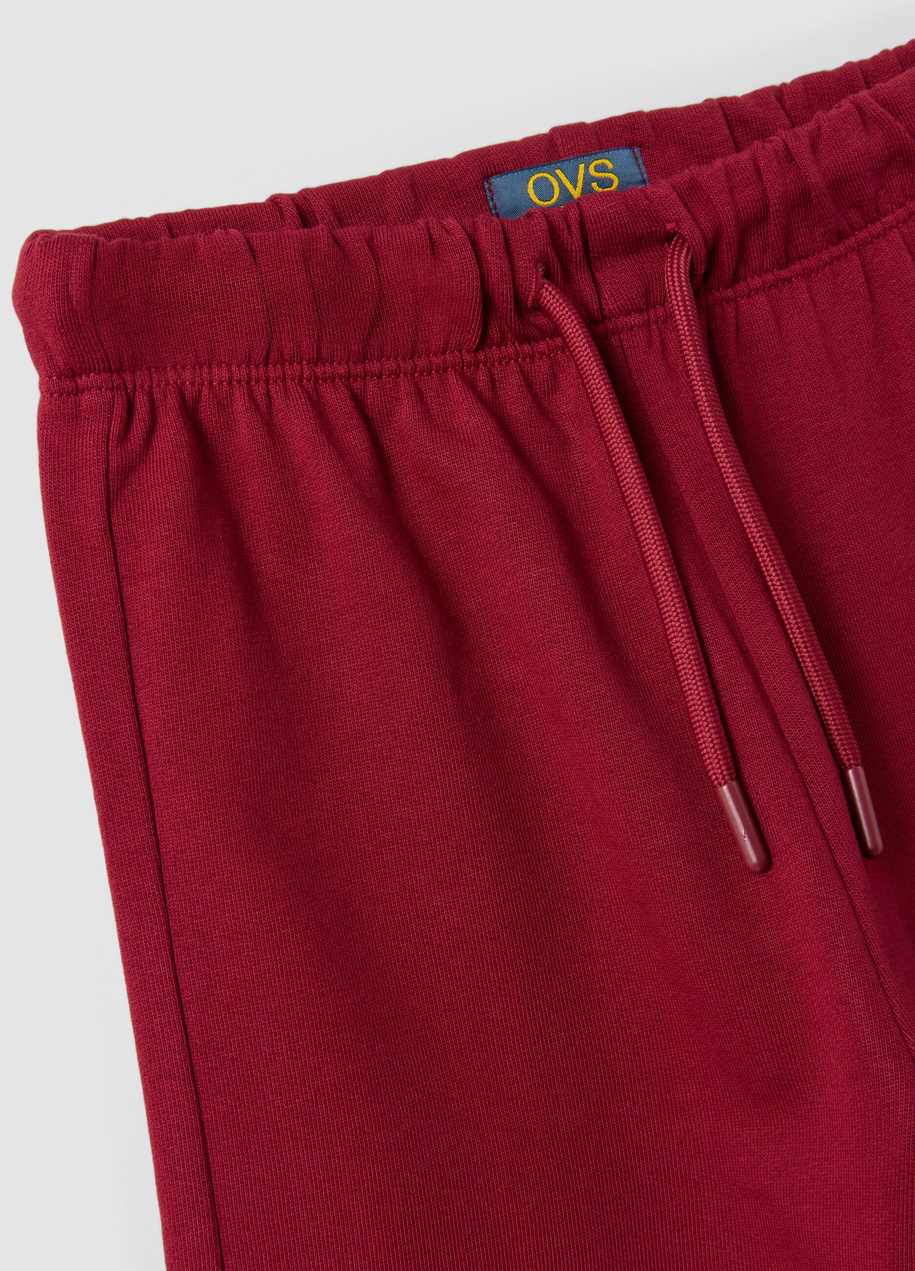Red pure cotton trousers with elasticated waist and bow for girls