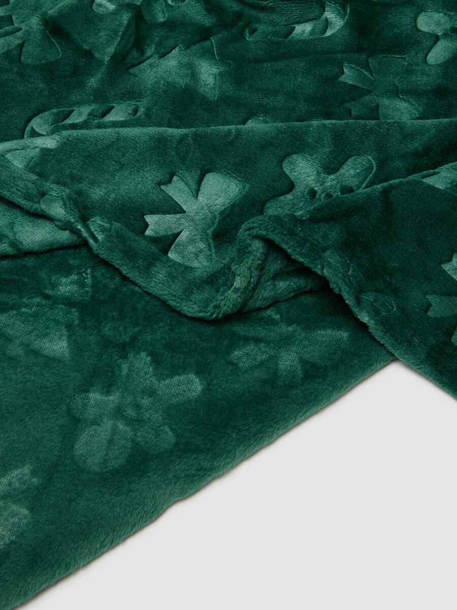 Green blanket with Christmas patterns_1