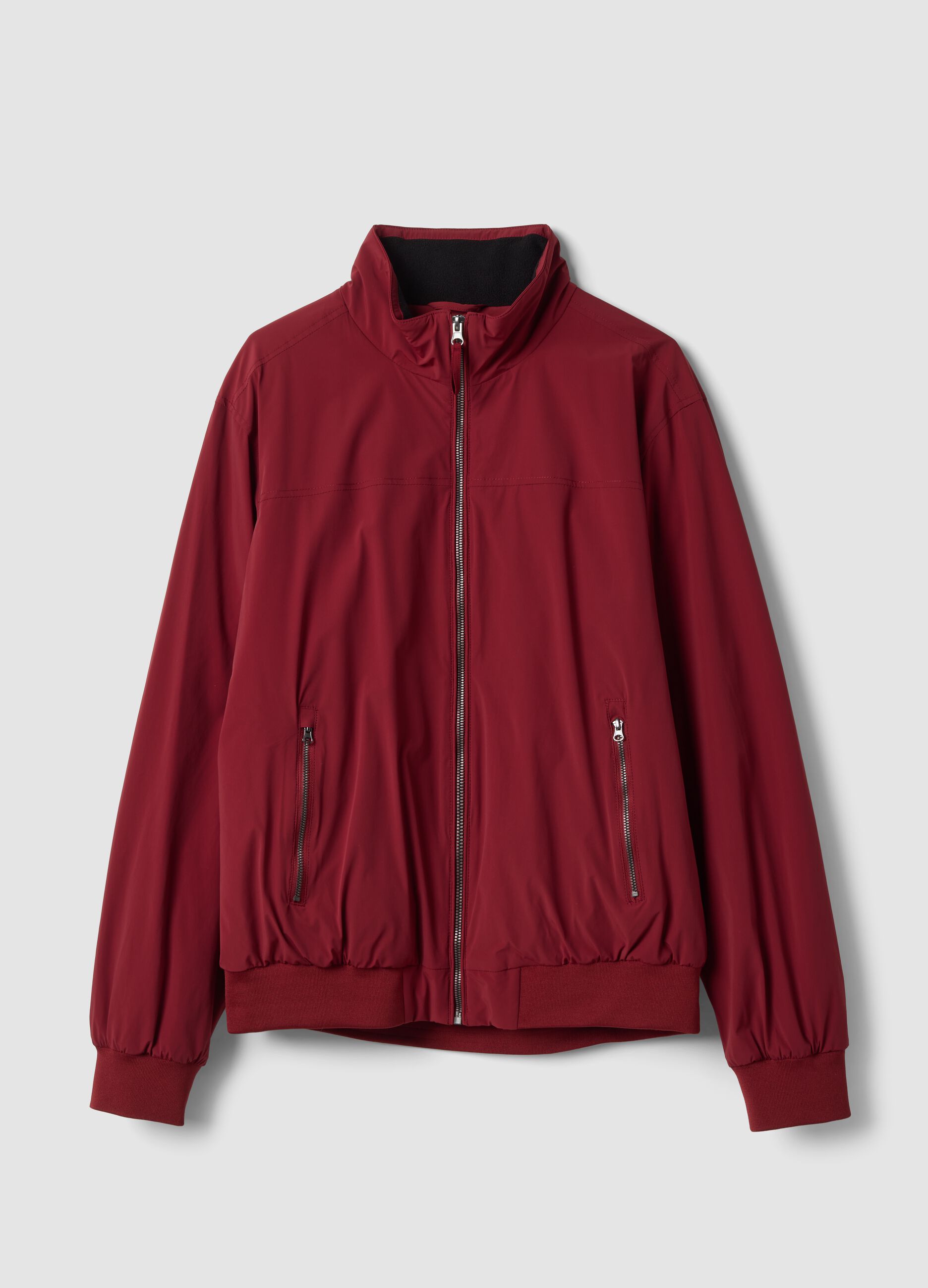 Rote Jacke aus Stretchmaterial mit Rei&szlig;verschluss