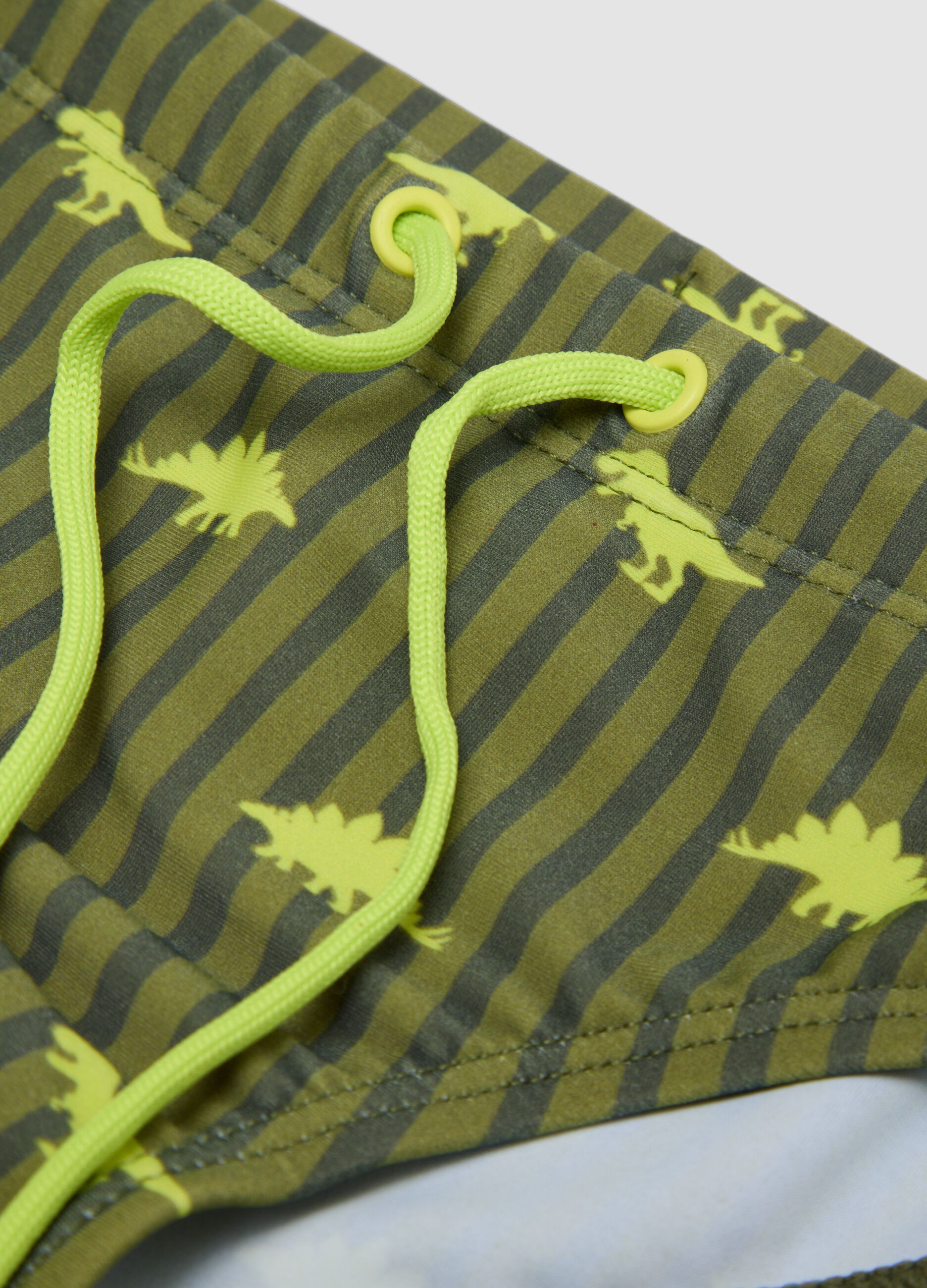 Gr&uuml;ne Stretch-Badehose mit Dino-Print
