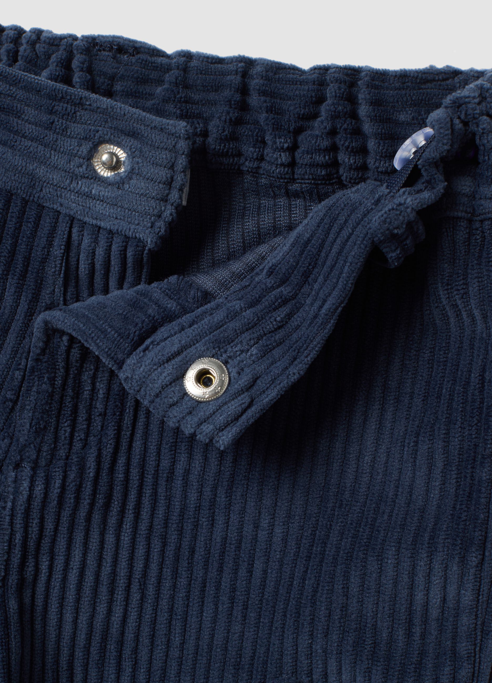 Blue ribbed over-fit trousers with patch pockets