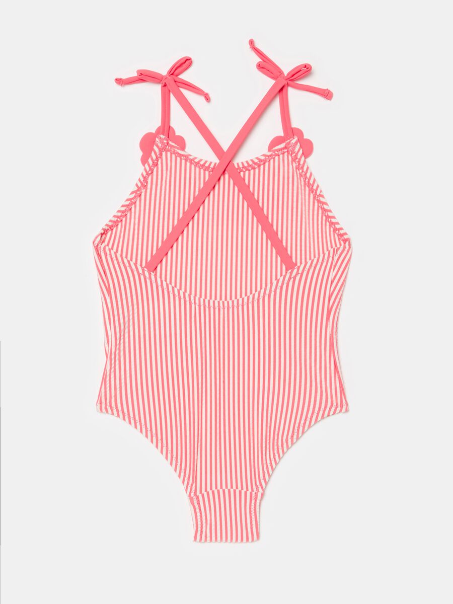 One-piece striped swimsuit with flowers and flounce_1