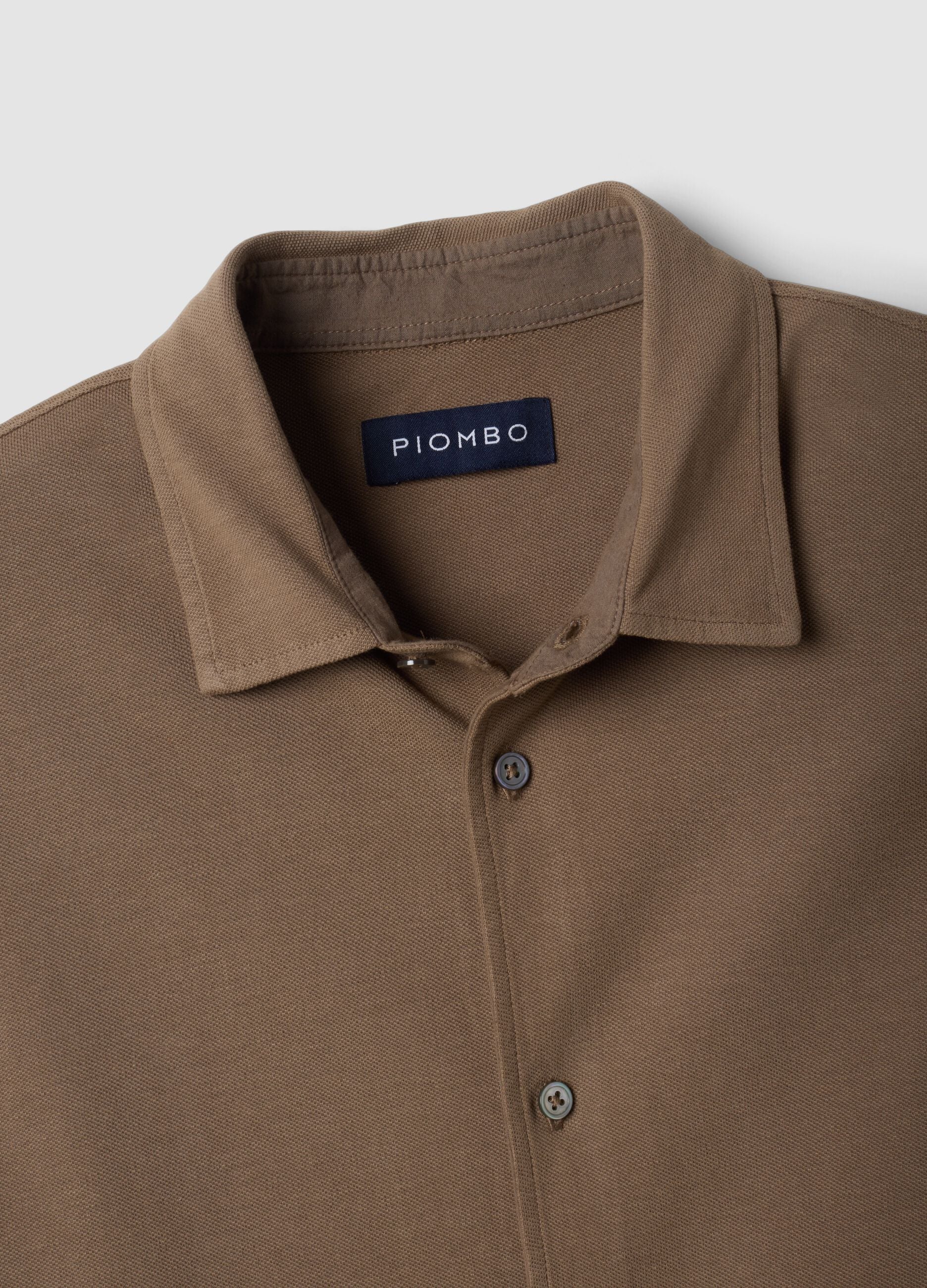 Polo piqu&eacute; marr&oacute;n de algod&oacute;n puro de manga larga, corte regular