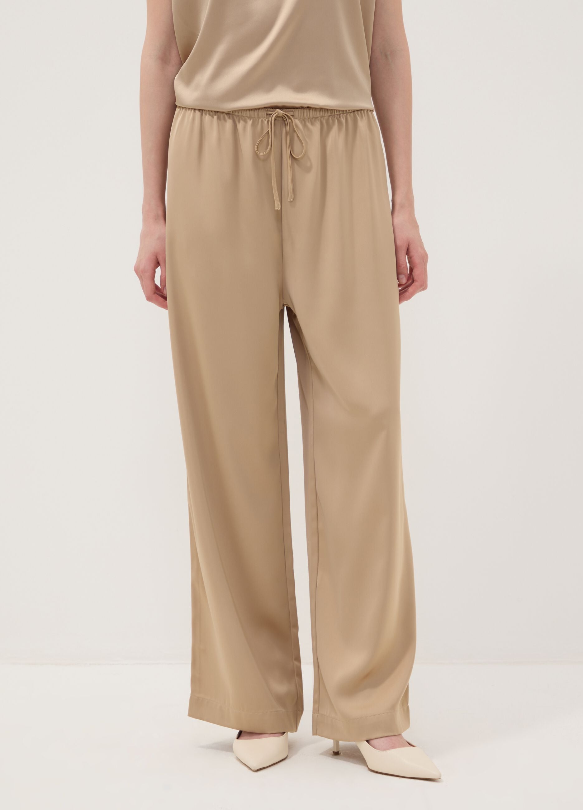 Beige wide-leg trousers with regular waist