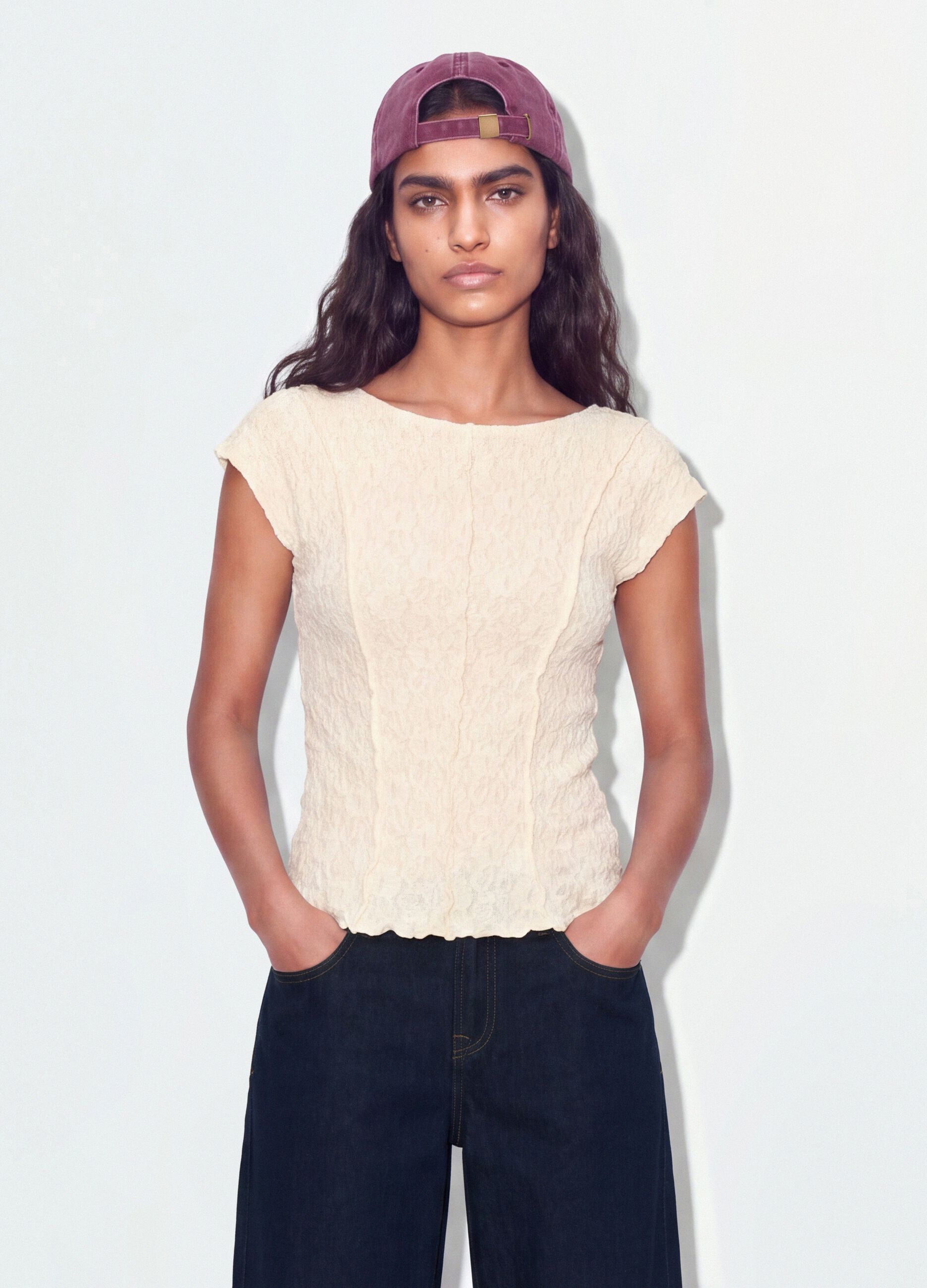 White stretch T-shirt with raised floral texture