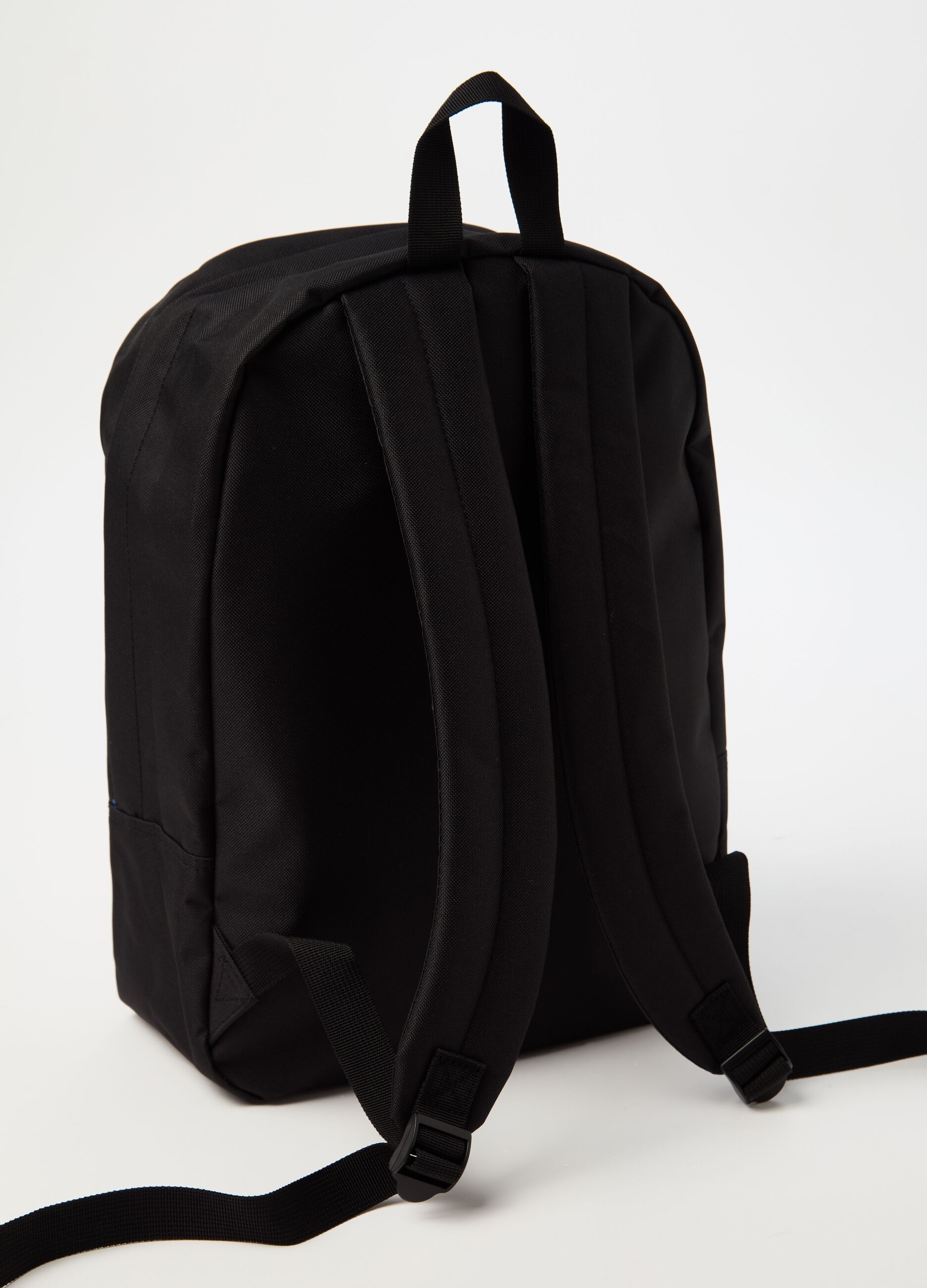 Backpack with external pocket