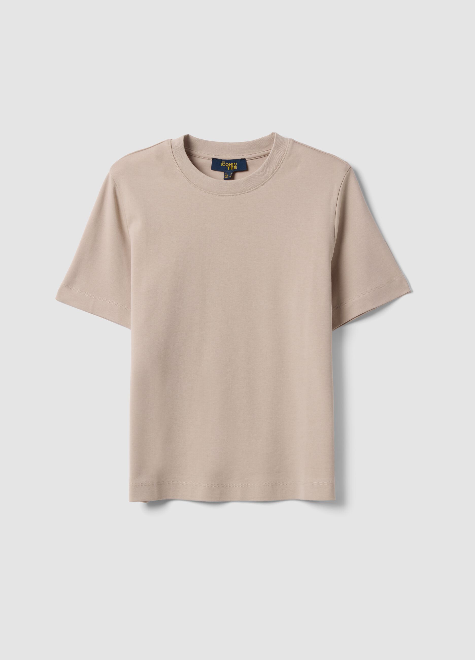 T-shirt bege de corte relaxed em algod&atilde;o puro de manga curta