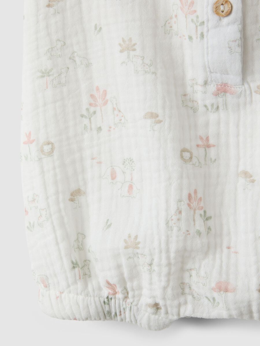 Pure white cotton baby girl's romper with ruffles_3